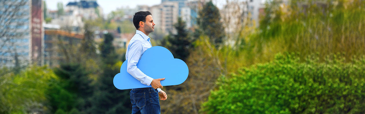 Business man holding a fake cloud