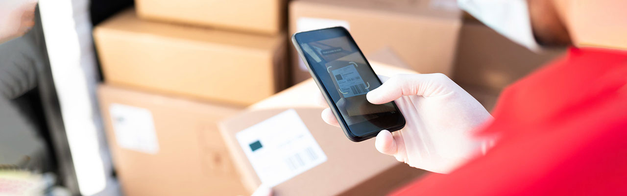 Delivery driver scanning a package