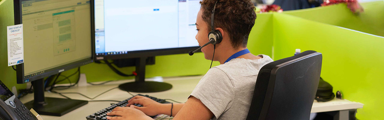 A woman answering a customer's call at a Datacom call centre