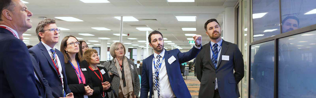 People taking a tour of the new facility