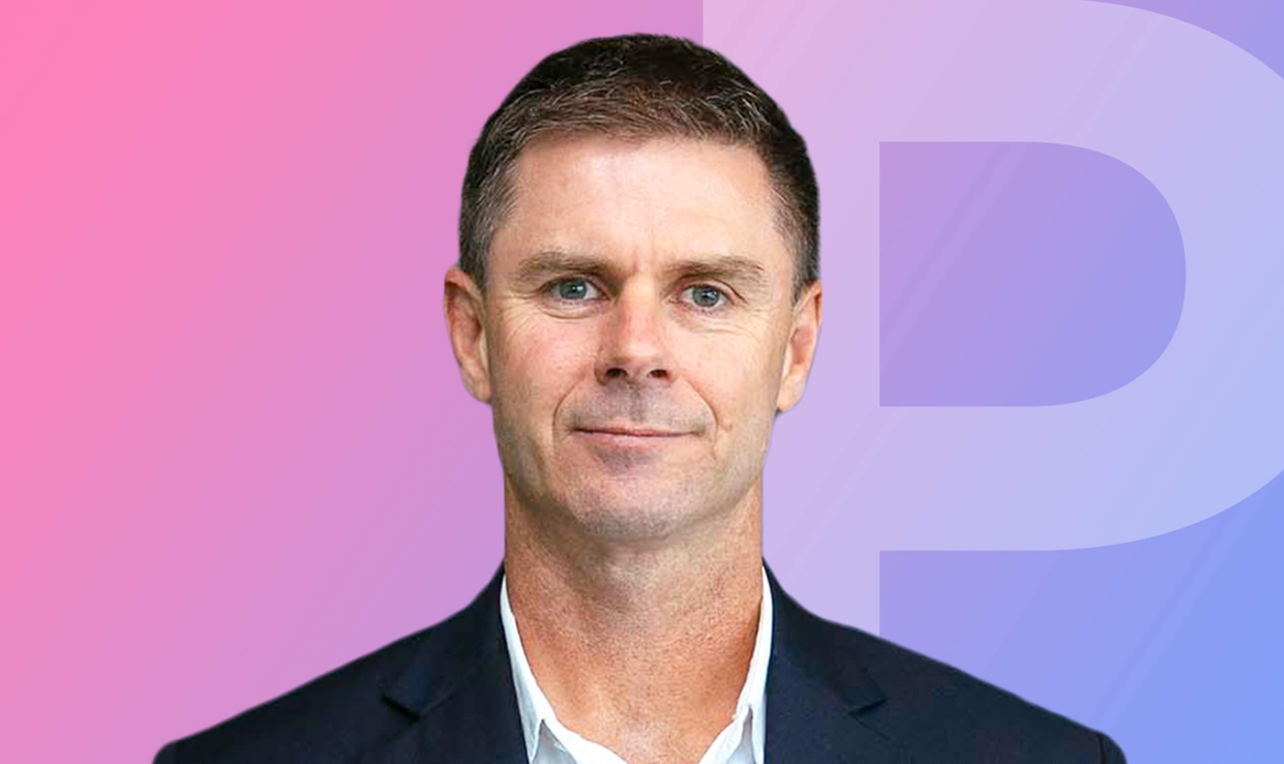 Profile photo of Peter Nelson standing in front of a pink and purple background