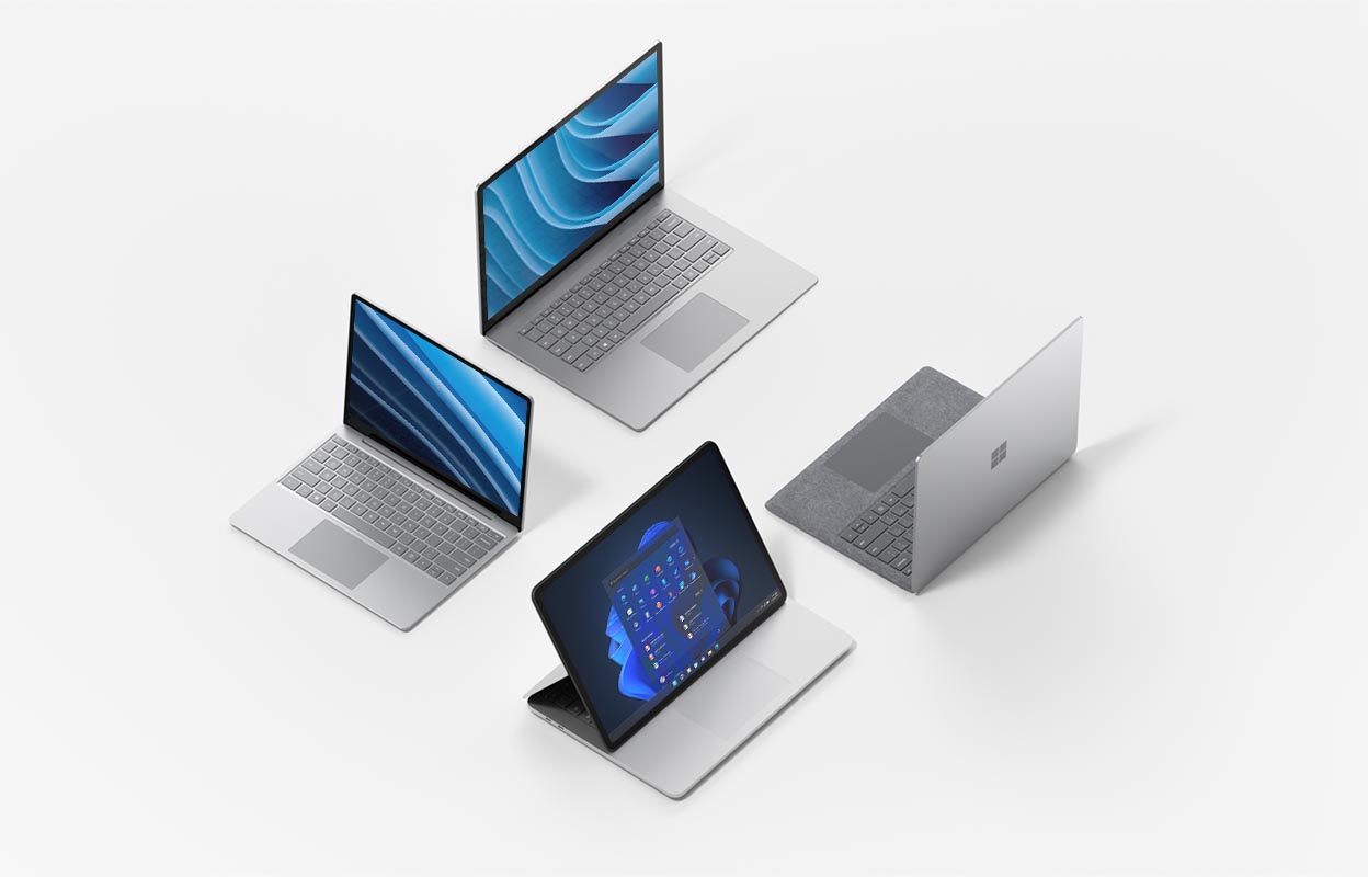 Four Microsoft surface devices in a promo image