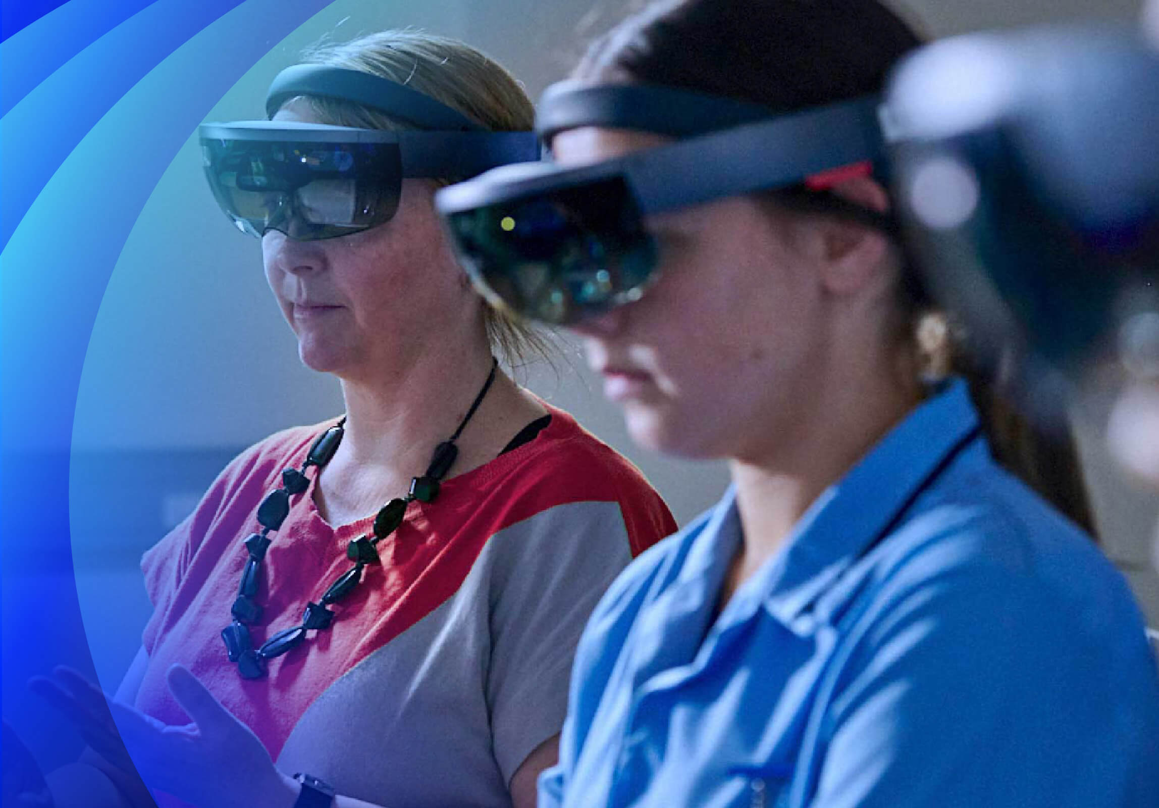 A female teacher and student using VR headsets