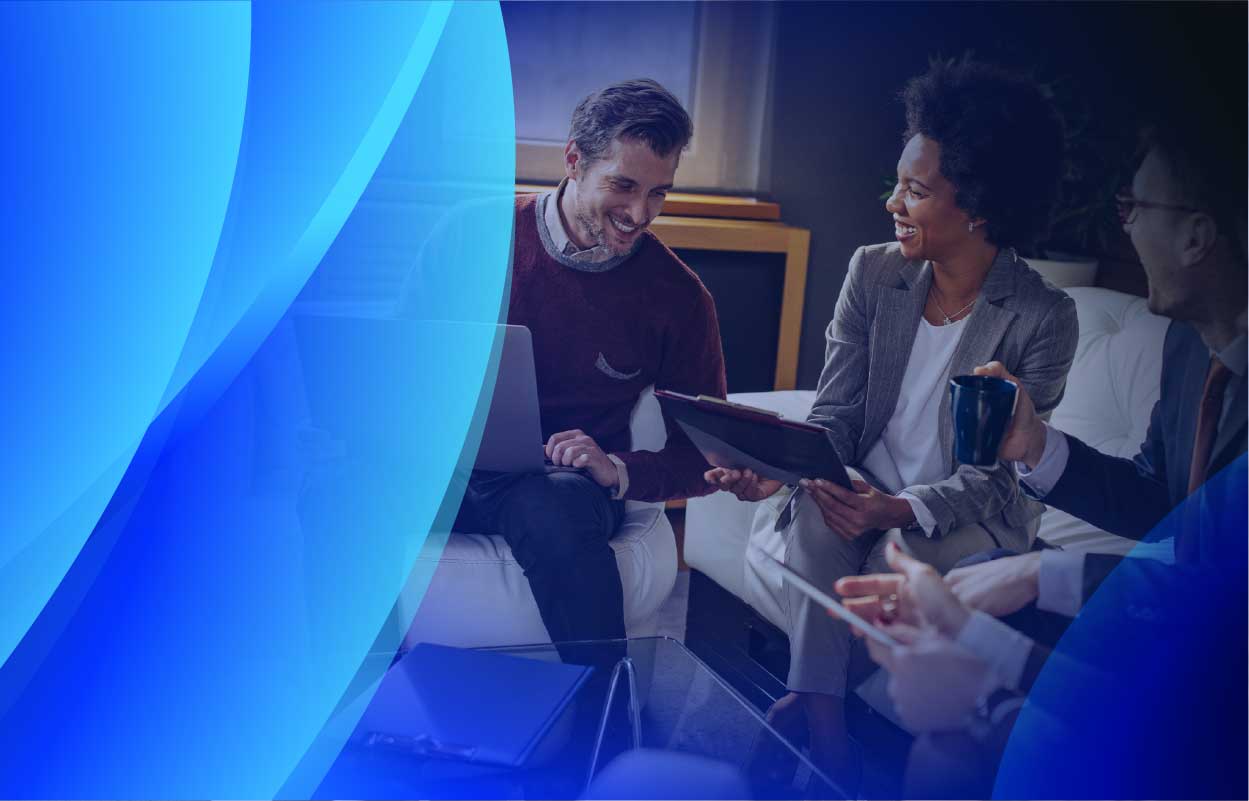A group of people in a meeting discussing software licensing