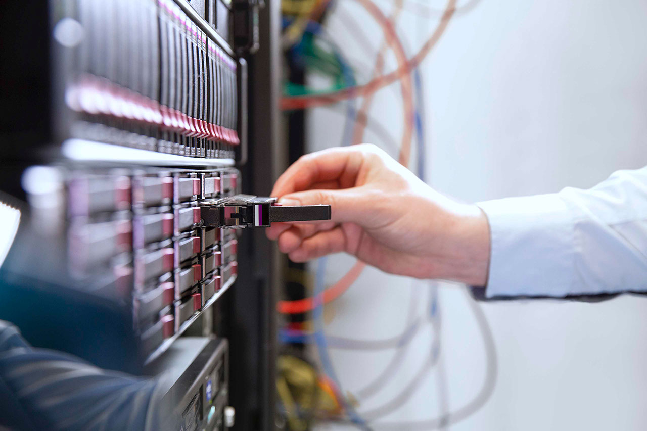 Data centre worker configuring servers