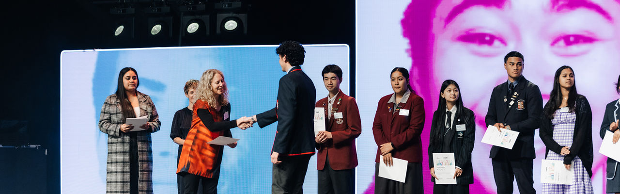 Young students at an awards ceremony