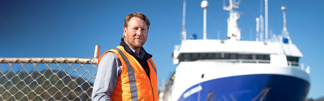 Sealord’s Resources Manager — Fishing Operations, Charles Heaphy with one of the company's fishing trawlers
